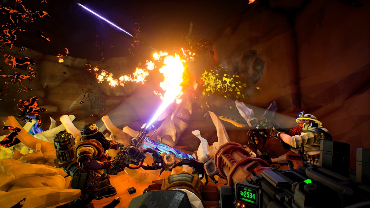 A mining squad fights creatures in a dark cavern.