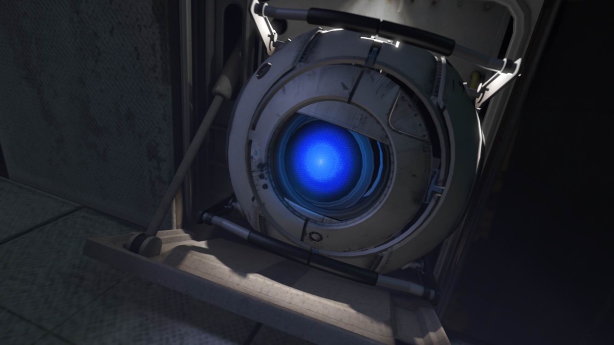 Wheatley floats inside an Aperture Science facility.