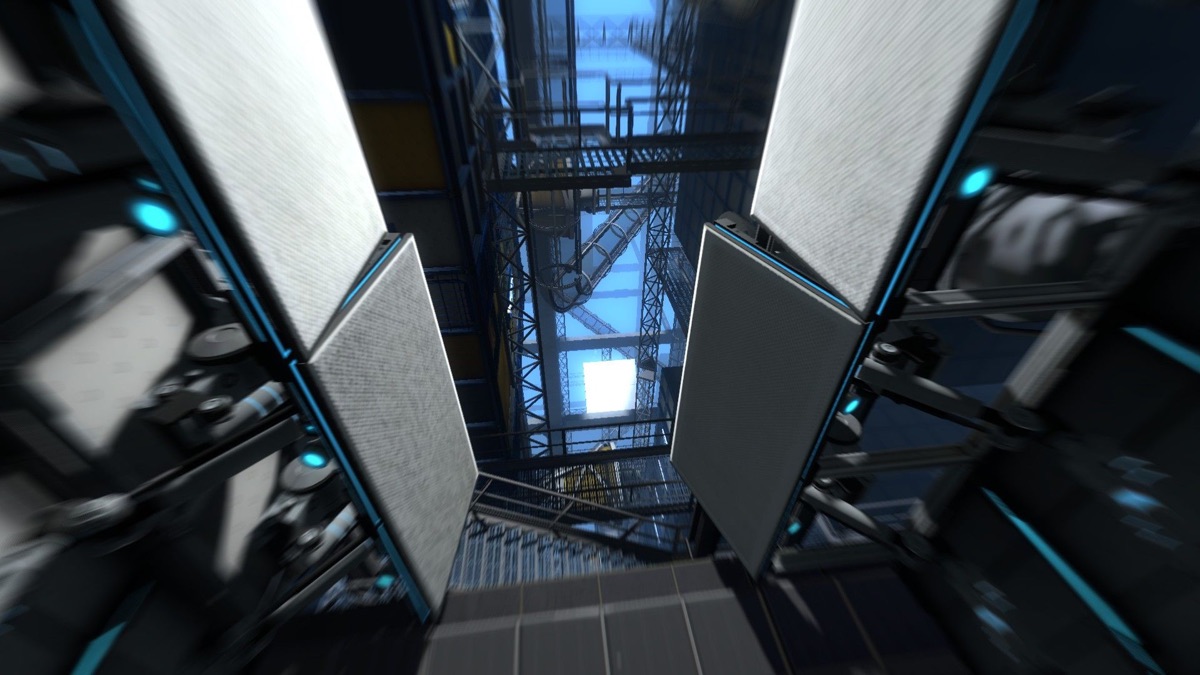 A first-person view looks through a tall mechanical test shaft.