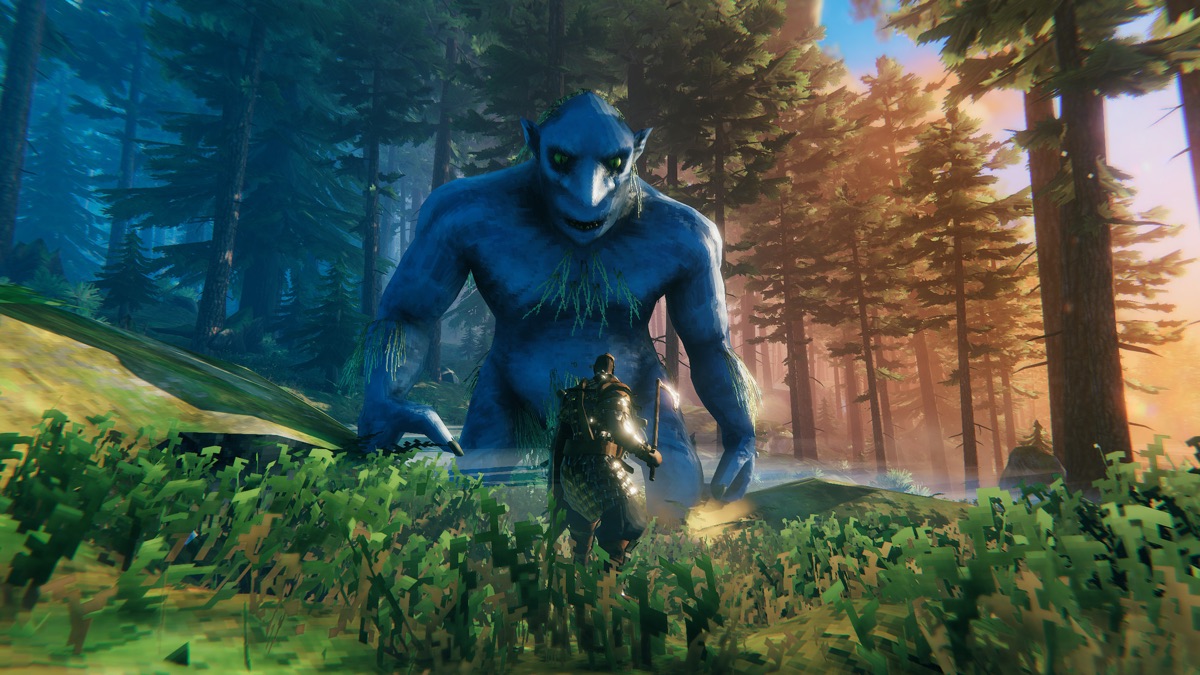 A Viking character explores a forest clearing.